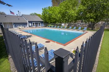 Swimming pool with oversized sundeck